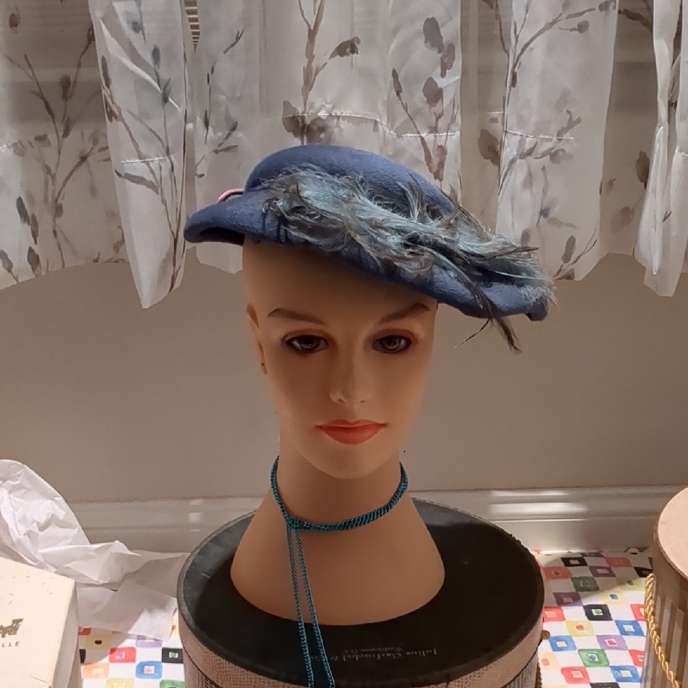 Elegant Blue Hat with Feather Detail